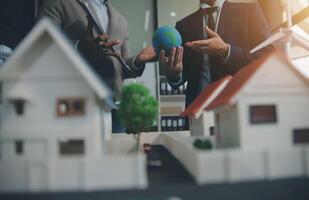 Green energy business company meeting with business people planning and discuss marketing of sustainable and renewable clean energy product with solar cell and wind turbine generator. Trailblazing photo