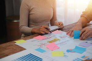 Team of business people working together in the meeting room office, teamwork background charts and graphs banner, double exposure successful teamwork,business planning concept. photo