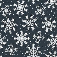 White big and small snowflakes in a seamless pattern on a dark gray background vector