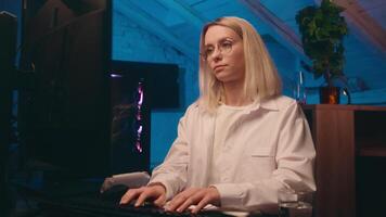 Caucasian businesswoman female girl satisfied happy business woman crypto trader coder IT programmer computer hacker student finish complete online work night late home office stretch hands relax rest video