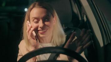 Drunk tipsy smiling laughing Caucasian woman female girl auto driver talk mobile phone call smartphone chatting unsafe driving danger stopped by police emergency light inside automobile car late night video