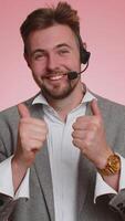 Business man wearing headset call center, support service operator helpline having talk with client photo