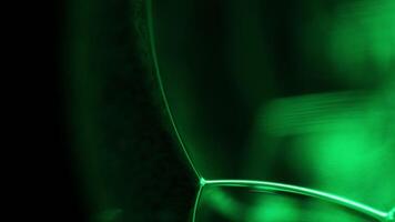 Green liquid, shampoo in macro, movement of liquid in a bubble, green absorption, chaotic movement video