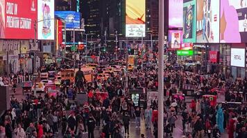 NEW YORK -28.10.2024 Night Scene in Times Square with Illuminated Billboards, A nighttime view of Times Square highlights towering, vibrant billboards illuminating the streets below, video