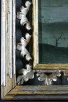 restoration of painting. fragment with probing in the process of restoration. old painting. photo