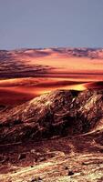 view of the yellow and rusty sandy mountains video