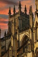 Stone Cathedral Spikes Against Sunset Sky in York, North Yorkshire, UK. photo
