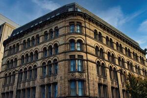 Arched Window Building with Ornate Stonework photo