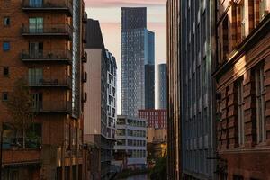 City Alleyway with Skyscraper in the Distance photo