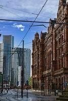 Tram Tracks and Buildings in a City photo