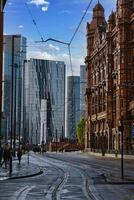 Modern and Traditional Architecture in a City Street photo