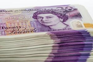 Stack of Twenty Pound British Banknotes with Queen Elizabeth II photo