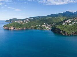 Drone view of the coast near Case-Pilote with the mountains in the background, Martinique, West Indies, France photo