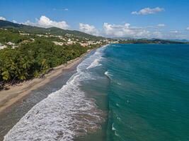 Aerial view of wave breaking at the Diamant, Martinique, West Indies, France photo