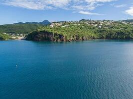 Drone view of the cliff and the ocean in front of Fond Lahaye, Martinique, West Indies, France photo