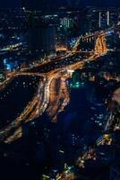 Aerial view of Hanoi skyline cityscape at night in Cau Giay district photo