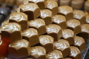 Indulgent and utterly Decadent Chocolate Treats are Masterfully Arranged in an Elegant Pyramid Shape photo