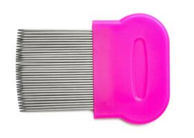 Lice comb with multiple fine teeth for effective lice removal and scalp care photo