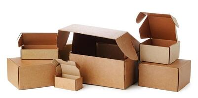 Stacked brown cardboard boxes in various sizes arranged on a white background photo