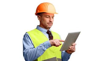 Building Engineer Using Digital Tablet Working Online Standing Over White Studio Background. Industrial Building Engineering, Builder Using Computer Browsing Internet Concept photo