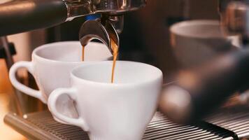 Closeup Of Working Coffee Machine With Cups, Barista Making Espresso In Coffeeshop. Selective Focus, Cropped photo