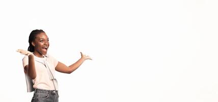 Omg. Excited Black Lady Shouting Looking Aside At Copy Space Gesturing With Hands Posing Over White Background. Studio Shot, Panorama photo