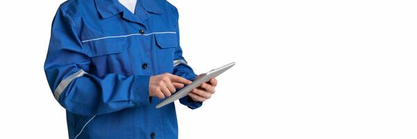 Application For Construction. Digital Tablet In Hands Of Unrecognizable Laborer In Work Uniform, Cropped Image, Panorama With Copy Space photo