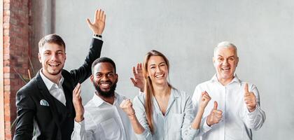 Successful Business Team. Joyful Coworkers Celebrating Success At Work Gesturing And Smiling To Camera Posing In Modern Office. photo