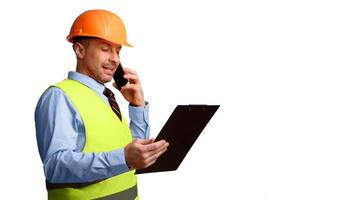 Professional Builder In Uniform Talking On Phone Holding Folder Standing On White Studio Background. Building Service Advertisement Banner Concept. Panorama, Copy Space photo
