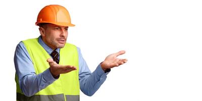Building Problem Concept. Discontented Construction Worker Builder Gesturing Emotionally Aside At Empty Space For Text Posing Over White Studio Background, Panorama photo