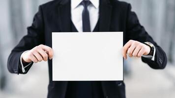 Waiting For You Concept. Empty name board in hands of meeting man in suit at airport, copy space photo
