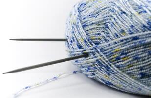 Blue wool and needles photo