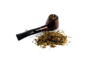 tobacco-pipe and heap of tobacco photo