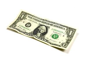one dollar on white photo
