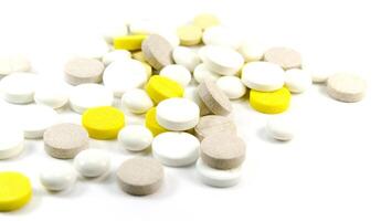 pills heap on white photo