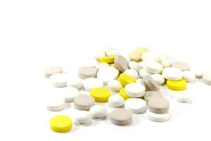 pills heap on white photo