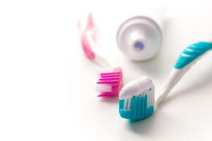 toothpaste and toothbrushes photo