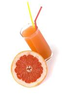 half of grapefruit and juice photo