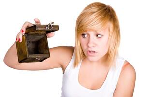 blond woman with empty wooden box photo