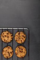 Baking grid with chokolate cookies. photo