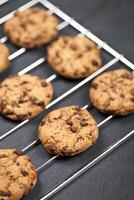 Baking grid with chokolate cookies. photo