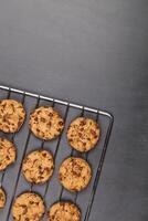 Baking grid with chokolate cookies photo