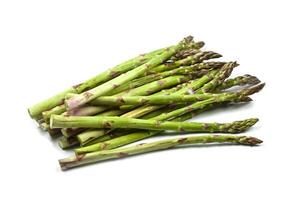 Bunch of fresh raw garden asparagus isolated on white background. Green spring vegetables. photo