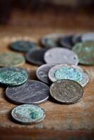 Pile of different ancient copper coins photo