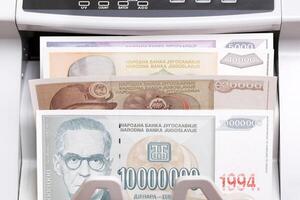 Yugoslav dinar in the counting machine photo
