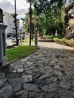 Tiled columns with a floor decorated with rocks photo