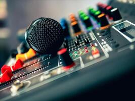 Close-up microphone on sound mixer in live broadcasting studio producer for sound record control system production and audio equipment and music instrument photo