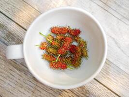 Top view of fresh ripe mulberries fruit, Ripe red mulberries photo