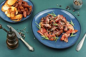 Crispy bacon wrapped dates. photo