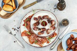 Crispy bacon wrapped dates. photo